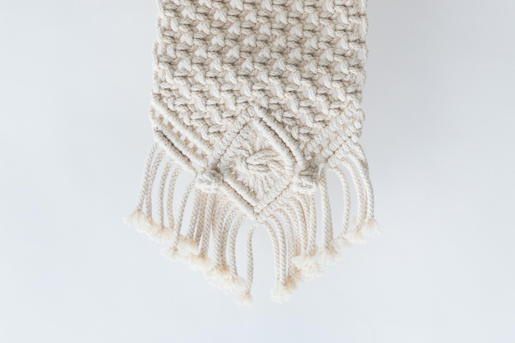 Coperta ricamata con dettagli di punto festone